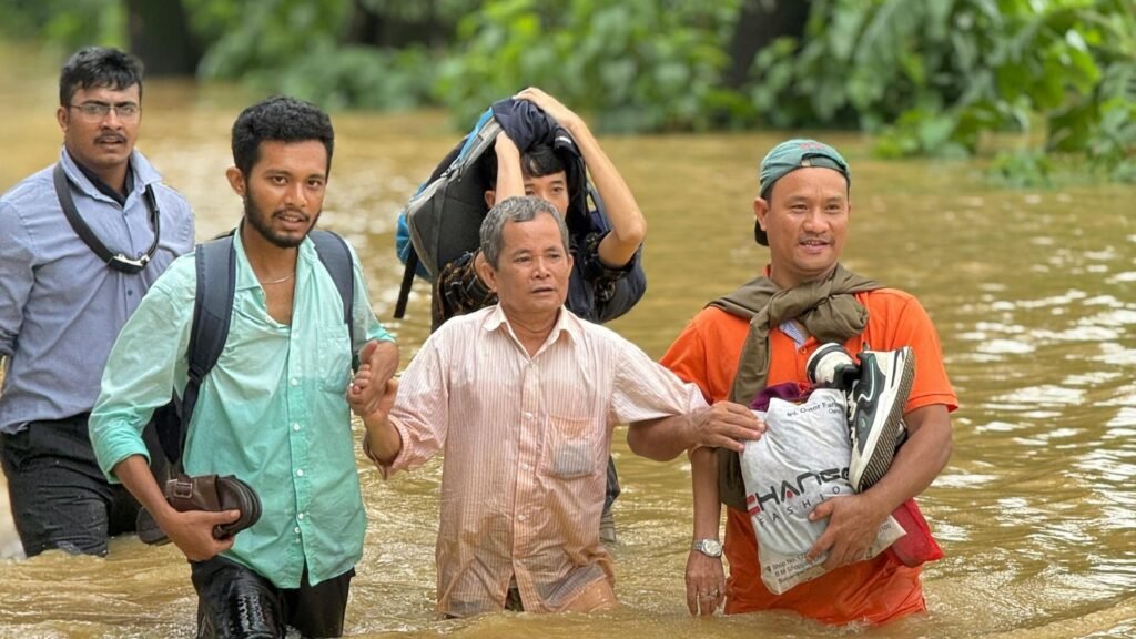 People being rescued in flood